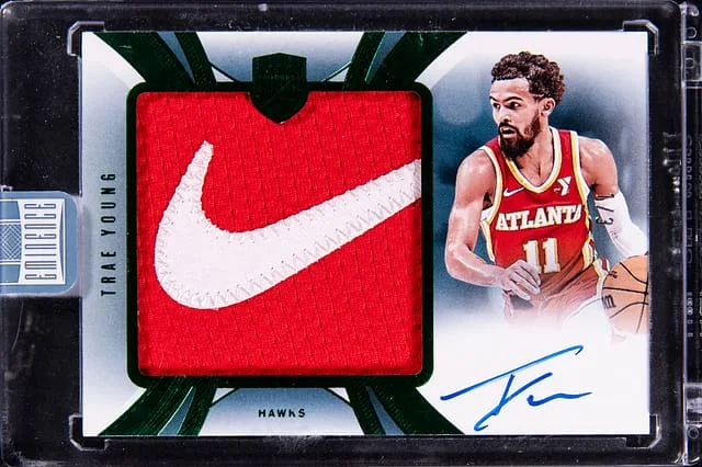 2024-25 Panini Eminence Trae Young Special Patch Autographs Emerald #SPA-TRA card image