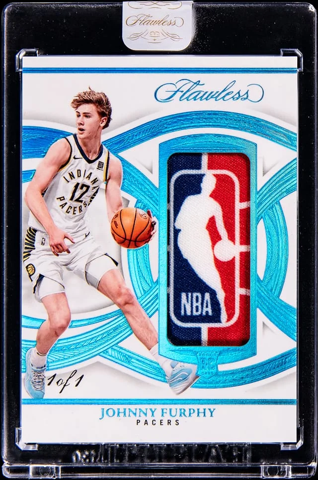 2024-25 Panini Flawless Johnny Furphy Logoman Patch - Patch Worn/Used on 1/25/25 in Paris - Panini Encased #LMG-JFP card image