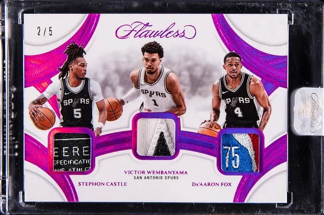 2024-25 Panini Flawless Victor Wembanyama/Stephon Castle/De'Aaron Fox Triple Patches Fuchsia #TP-SAS card image