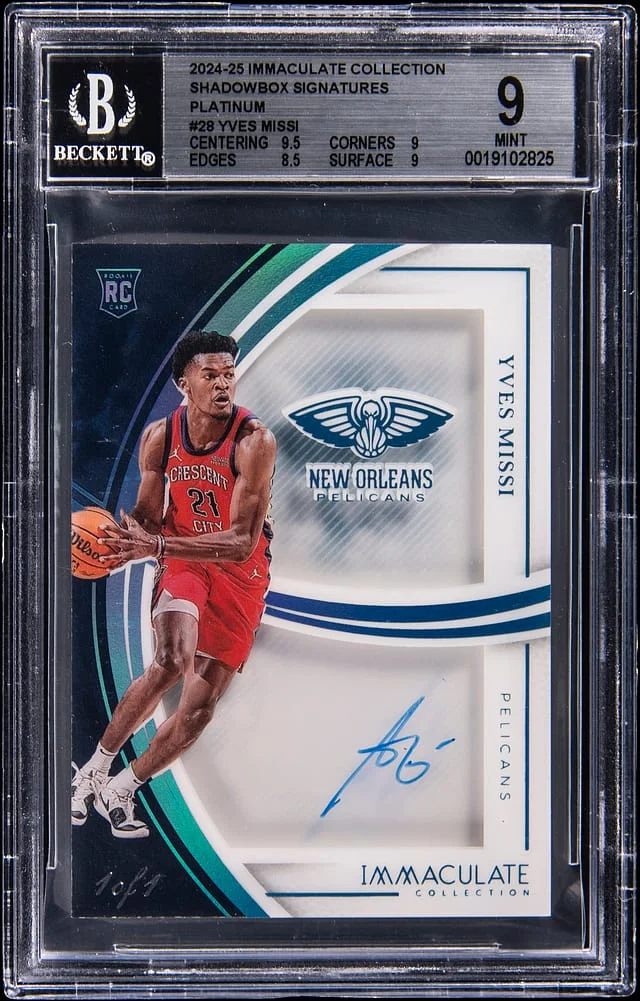 2024-25 Panini Immaculate Yves Missi Shadowbox Signatures Platinum #SS-SSI card image