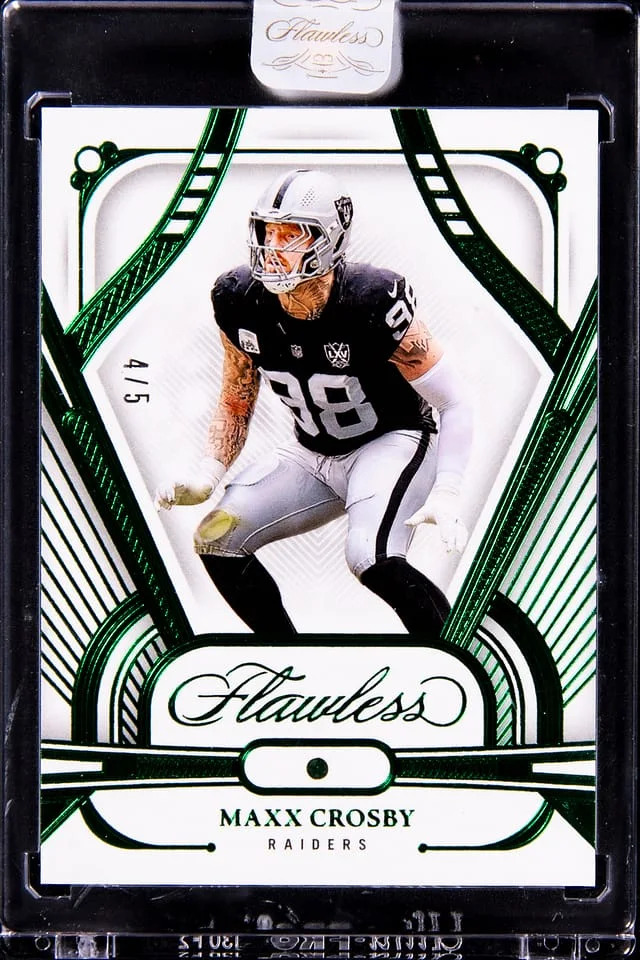 2024 Panini Flawless Maxx Crosby - Panini Encased Emerald #39 card image