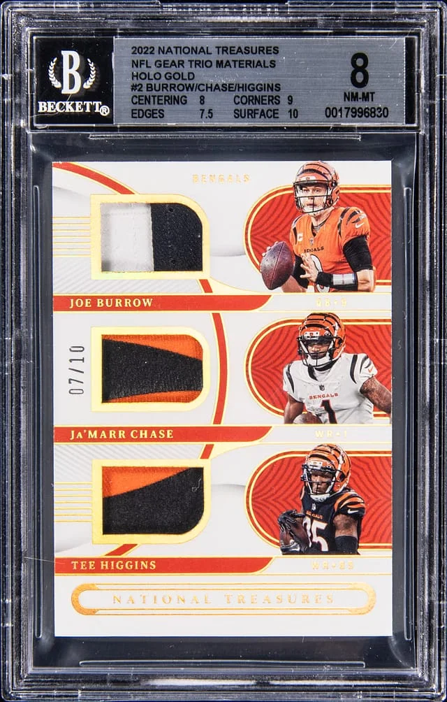 2024 Panini National Treasures Joe Burrow, Ja'Marr Chase, Tee Higgins NFL Gear Trio Materials-Holo Gold #2 card image