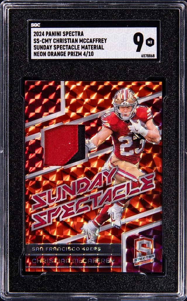 2024 Panini Spectra Christian McCaffrey Sunday Spectacle Material-Neon Orange Prizm #SS-CMY card image