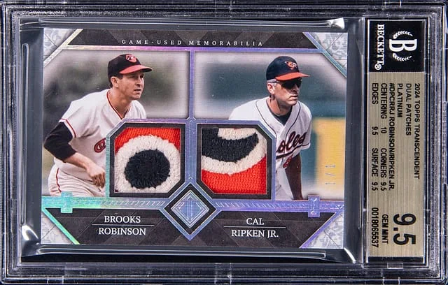 2024 Topps Brooks Robinson/Cal Ripken Jr. Game-Used Transcendent Collection Dual Patches Platinum #DPC-RRJ card image