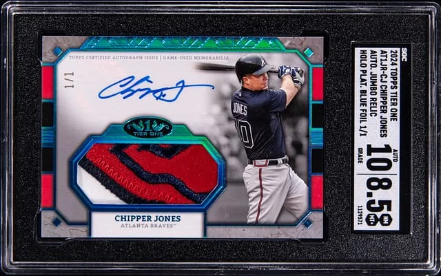 2024 Topps Chipper Jones Tier One Autograph Jumbo Relic Holo Platinum Blue Foil #AT1JR-CJ card image