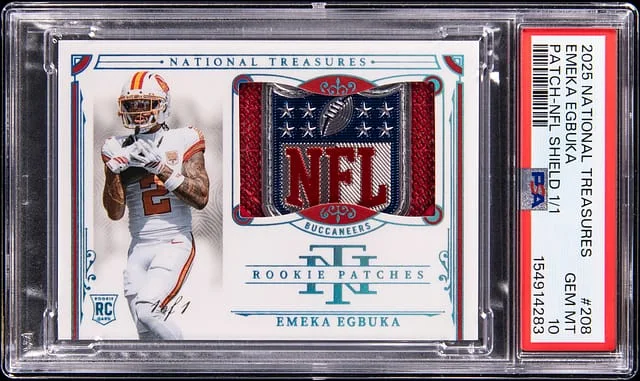 2025 Panini National Treasures Emeka Egbuka NFL Shield Patch NFL Shield #208 card image