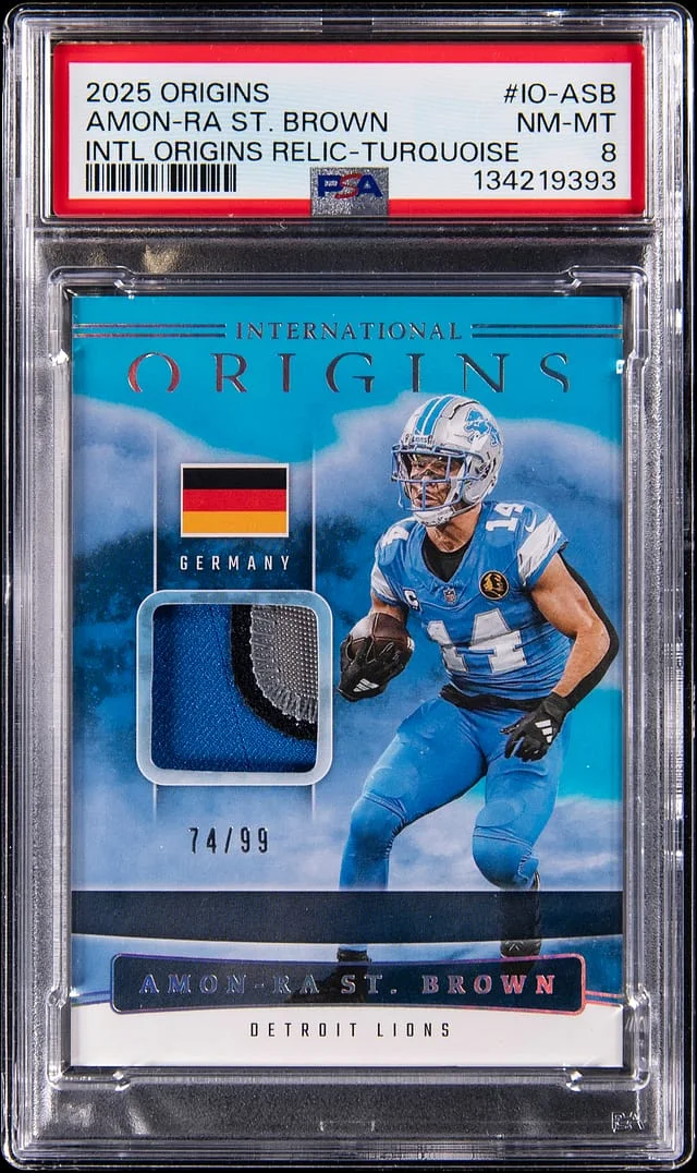 2025 Panini Origins Amon-Ra St. Brown International Origins Relic-Turquoise #IO-ASB card image