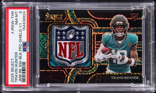 2025 Panini Select Travis Hunter Jumbo Swatch Black Prizm Shield #JRSW-THR card image